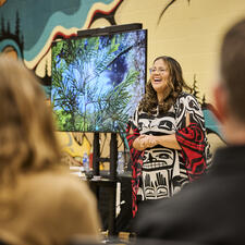 Representative from Mathxwi First Nation address the audience about the importance of the enhancement agreement